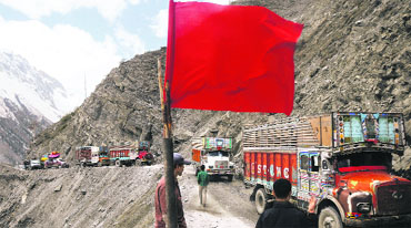 Vehicles plying on the Srinagar-Leh road near Zojila