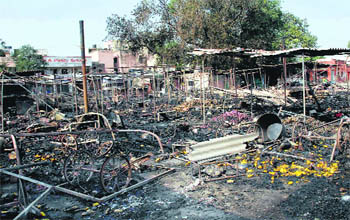 The damaged kiosks and carts at the sabzi mandi at Jalandhar cantonment. 