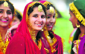 Students of BVM Senior Secondary School await their turn during a summer camp in Ludhiana on Wednesday.