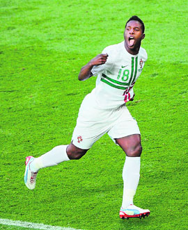 Portuguese forward Silvestre Varela celebrates after scoring the winner against Denmark at the Arena Lviv on Wednesday. Portugal won 3-2.