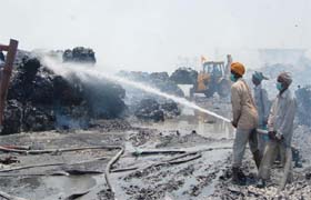 Firemen douse flames at Khanna Paper Mill in Amritsar on Thursday