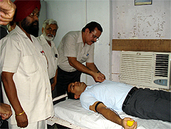 Deputy Commissioner of Bathinda, KK Yadav, donating blood at a camp organised by the health authorities at the Blood Bank at Civil Hospital in Bathinda on Thursday