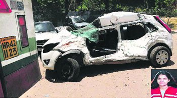 The ill-fated car that met with an accident with a Himachal Roadways bus in which Sonia (inset) was killed at the Sectors 45-46,49-50 light point in Chandigarh on Wednesday night.