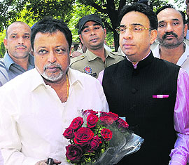 Union Railway Minister Mukul Roy (left) is welcomed by Rajya Sabha MP KD Singh at Sector 26 in Chandigarh on Thursday. 