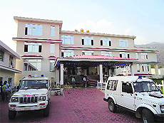 Police officials inside the palatial house from where eight Taiwanese nationals were arrested at Chauntra in Mandi, on Thursday.