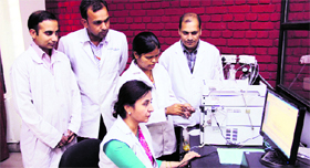 Dr Monica Gulati and her team members, who claim to have formulated a drug to overcome the side effects of the drugs used for treating colon cancer, on the LPU campus, near Jalandhar, on Thursday.
