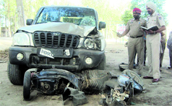 A scooter which was completely damaged after being hit by a Scorpio in an accident on the Ludhiana-Moga highway near Jagraon on Thursday.
