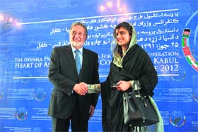 Pakistan Foreign Minister Hina Rabbani Khar with her Afghan counterpart Zalmai Rasool before the start of the Heart of Asia Ministerial Conference in Kabul