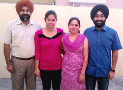 Dr Harpreet Singh (extreme right) with his family.