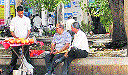 Despite a ban on the sale of cut fruits, a vendor sells cut fruits on the rear of the DC office in Sector 17, Chandigarh, on Friday