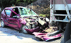 The mangled remains of the car that met with an accident in Batote on Friday
