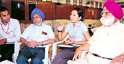 Members of Roko Cancer Charitable Trust address mediapersons in Amritsar on Saturday