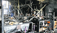 The gutted top floor of the UCO bank in Sector 17, Chandigarh, on Saturday. 