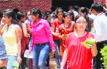 Students come out of the examination centre after appearing in the Other Common Entrance Test (OCET) conducted by Panjab University in Chandigarh on Saturday.
