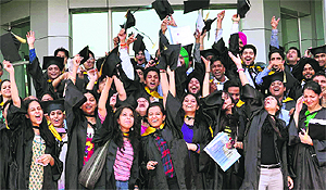 Students celebrate after receiving their degrees at the annual convocation of Swami Vivekanand Group of Institutes near Banur.