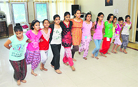 Children learn dance at a summer camp at KL Sehgal Hall in Jammu.