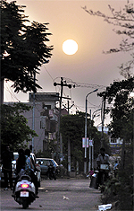 Setting sun seems to be lighting up the skyline of otherwise “powerless” Ludhiana on Saturday evening