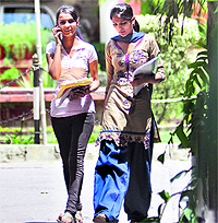 Girls carry prospectuses of one of the city colleges in Ludhiana