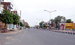 A deserted road in the city on Sunday as people preferred to keep indoors due to the intense heat that has been searing the region