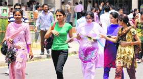 Students come out after appearing in the OCET at Panjab University in Chandigarh on Sunday.