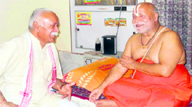 RSS national chief Mohan Bhagwat during a discussion with Jagadguru Ramanandacharya Ram Bhadracharya Maharaj at the Chitrakoot ashram in Haridwar on Sunday.