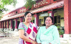 Darshana Rani (right) along with Principal Gurinderjit Kaur at Government Girls Senior Secondary School, Nehru Garden, in Jalandhar