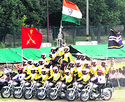 Personnel of the Northern Command display their skills during a motorcycle show held on Raising Day in Udhampur on Sunday
