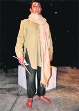 An artiste enacts a scene during the play Maa Mujhe Tagore Bana Do at Natrang Theatre in Jammu on Sunday.