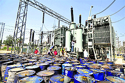 Employees of Power Corporation repair the transformer at 220 KV sub-station on Ferozepur Road in Ludhiana