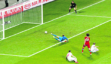 Czech Republics Petr Jiracek (No. 19) scores past Polands goalkeeper Przemyslaw Tyton during their match in Wroclaw on Saturday. 