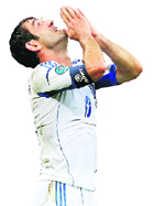 Greeces captain Giorgos Karagounis celebrates after scoring the winning goal against Russia in Warsaw on Saturday.