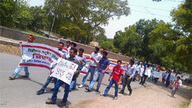 Intern doctors brave the scorching heat to hold a protest march in Faridkot on Monday.