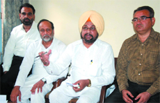 BJP leaders addressing a press meet in Bathinda on Monday.