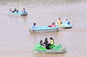 Tourists boat without life jackets at the Sukhna Lake in Chandigarh on Monday