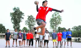 A handball player practises at DAV School, Sector 8, Chandigarh, on Monday
