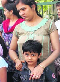 Jashan with his mother at Sector 9 in Panchkula on Monday