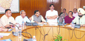Uttarakhand Chief Secretary Alok Kumar Jain (second from left) chairs a meeting regarding the preparations for the Nanda Devi Rajjat yatra in Dehradun on Monday. 