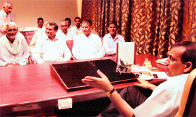 Deputy Commissioner ML Kaushik heads a meeting of pro-nuclear plant farmers at Fatehabad on Monday.