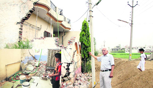 The house, whose boundary wall and (inset) a washroom collapsed due to sewerage-laying work by the Punjab Water Supply and Sewerage Board, at Nangal Shama village in Jalandhar on Monday.