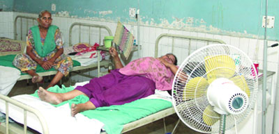 In the absence of inadequate fans at the Civil Hospital, patients are left with no option but to bring their own fans to get relief from the scorching heat. 