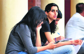 Students fill admission forms in Ludhiana.