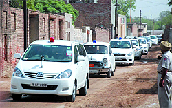 A cavalcade of vehicles of the members of the Standing Parliamentary Committee on agriculture enters Jajjal village in Bathinda district on Tuesday