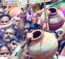 BJP supporters protest against the shortage of water, outside the CMs office at Delhi Secretariat on Tuesday. 