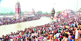 A sea of devotees at Brahamkund, Har-ki-Pauri, on the occasion of Aasadhi amavasya in Haridwar on Tuesday.