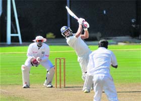 India As Manoj Tiwary plays a shot against West Indies A team during the third day's play in St. Lucia on Monday