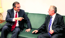 Leader of the New Democracy conservative party Antonis Samaras (L) with Democratic Left party leader Fotis Kouvelis in Athens.
