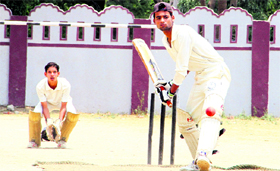 A batsman in action in a match during the Shyam Dutt Joshi Memorial Cricket Tournament under way at Survey Stadium in Dehradun on Wednesday.