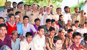 Students and management of the Al-Khari Foundation with the Commandant of 5th Battalion of the IRP, DK Salathia, during a function in Doda on Wednesday
