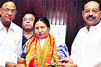 BJP district president Subash Sood welcomes councillor Satya Bhagat from Ward 32 to the partys fold in Jalandhar on Wednesday