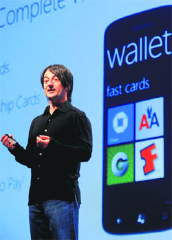 Joe Belfiore, corporate vice president of Microsoft, introduces the Windows Phone 8 mobile operating system in San Francisco, California on June 20. The feature lets users pay merchants using near field communication (NFC) technology. 